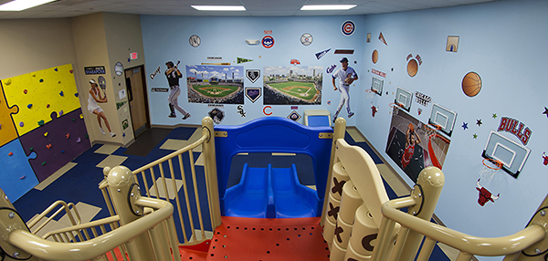 Indoor playground with wall of sports