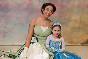 Two girls posing for a photo at the ball