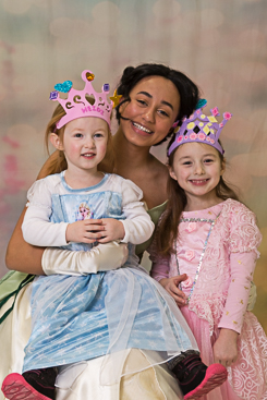 Three smiling girls at the ball