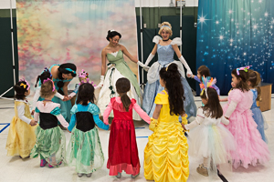 Kids watching princesses at dance