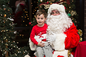 Santa hanging out with boy