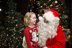 Child talking to Santa