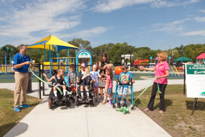 Ribbon cutting opening the park