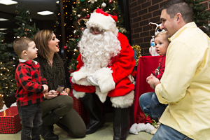 Family visiting Santa