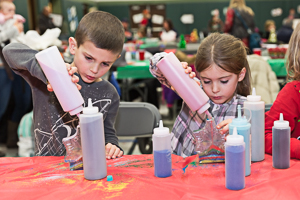 Kids decorating and creating Christmas goods